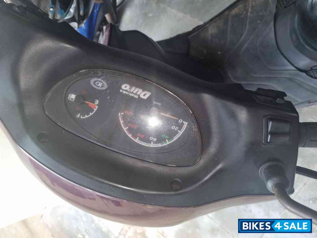 Maroon Mahindra Duro