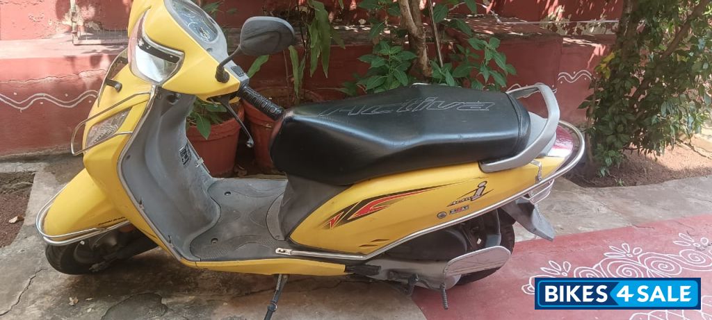 Yellow Honda Activa i