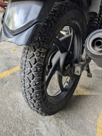 Orange Suzuki GS 150R