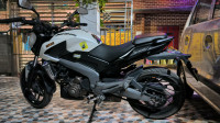 Moon White Bajaj Dominar 400 Disc