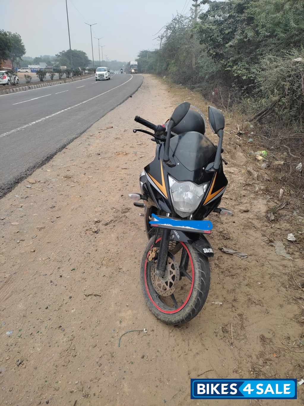 Golden And Black Suzuki Gixxer SF Fi