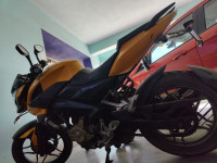 Yellow Bajaj Pulsar 200 NS