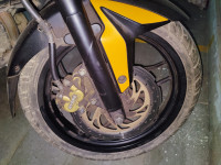 Yellow Bajaj Pulsar 200 NS