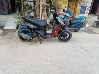 Black Aprilia SR 150