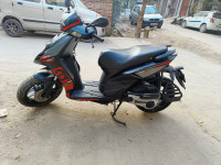 Black Aprilia SR 150