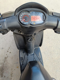 Black Aprilia SR 150