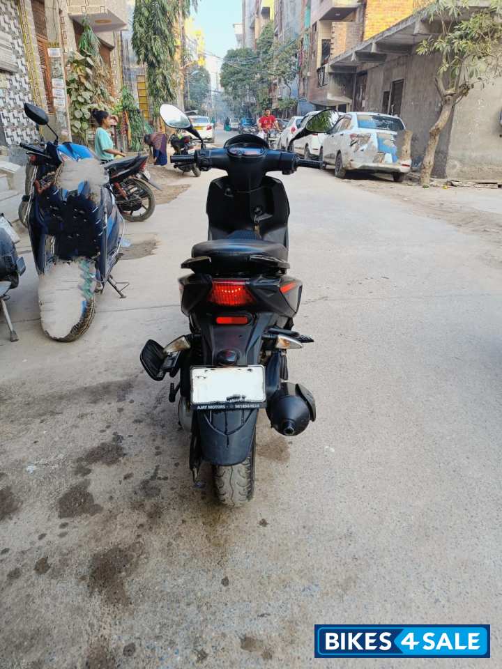 Black Aprilia SR 150