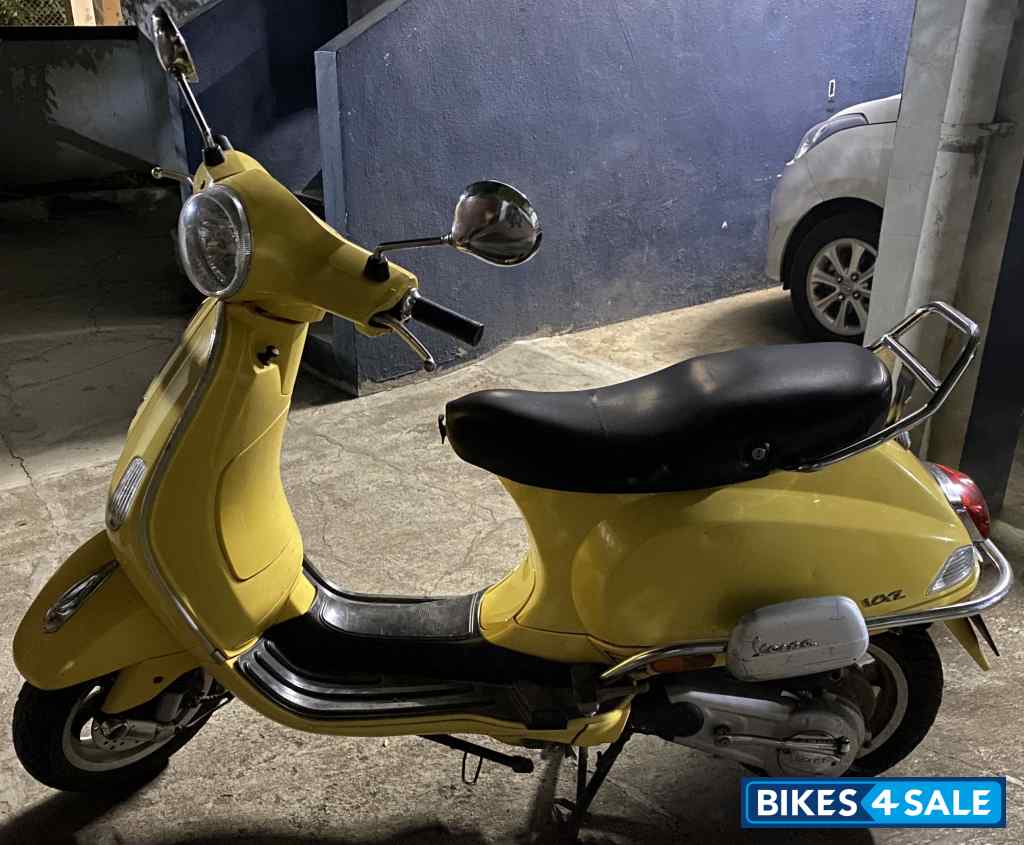 Yellow Vespa VXL 125