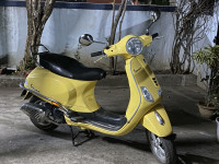 Yellow Vespa VXL 125