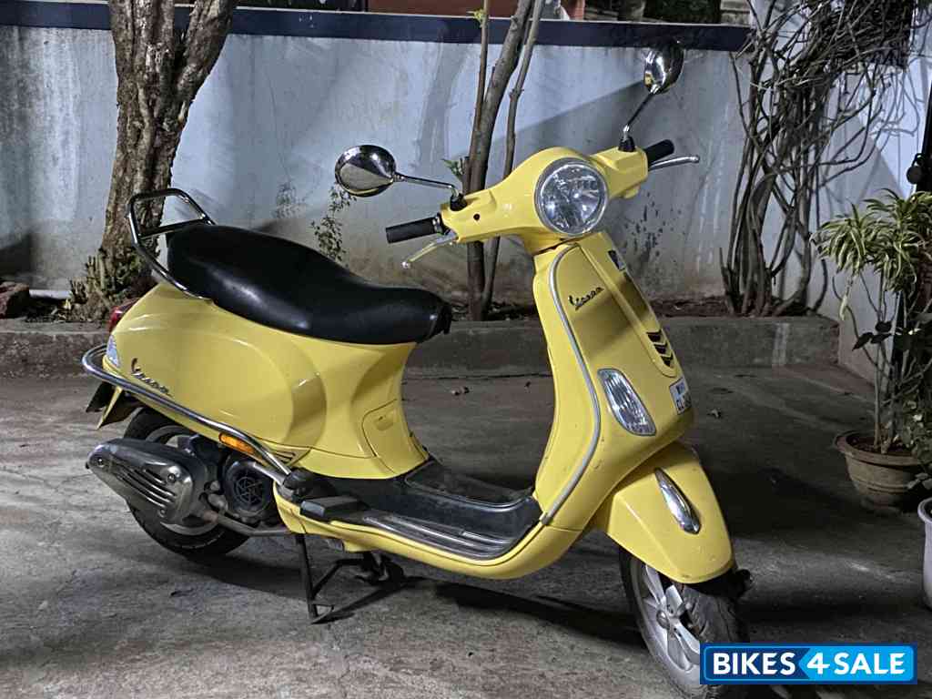 Yellow Vespa VXL 125