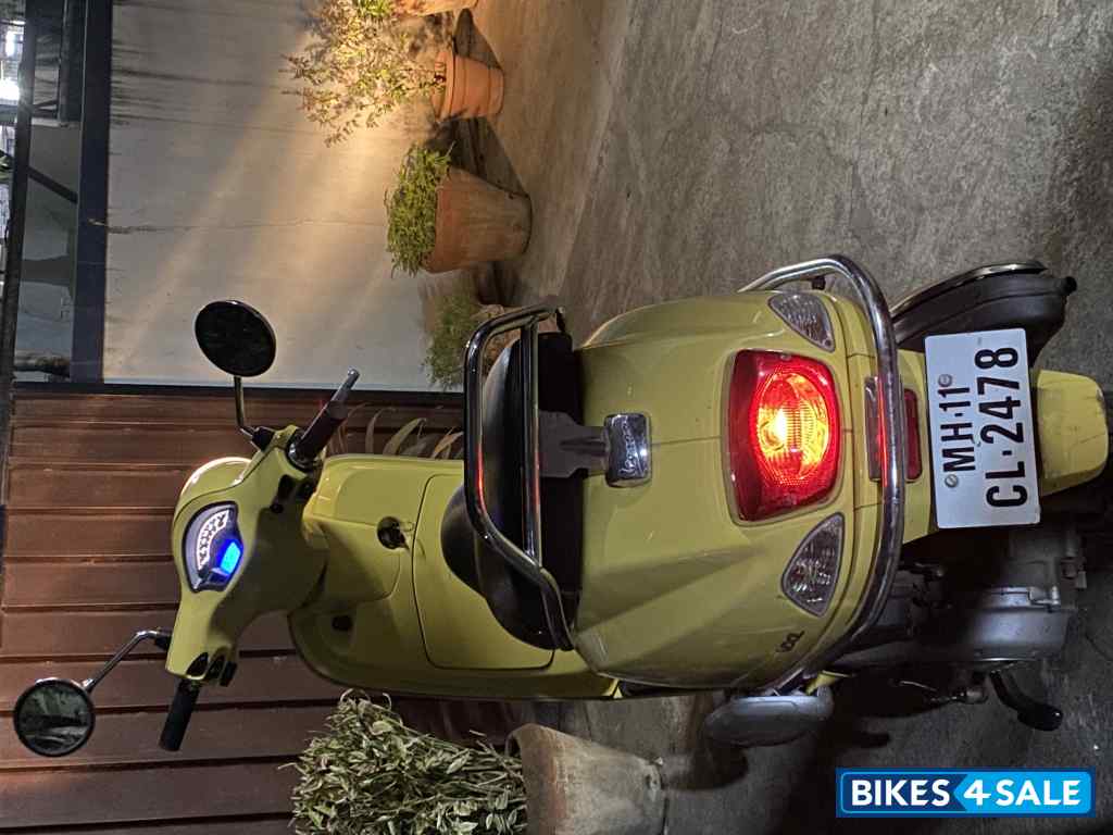 Yellow Vespa VXL 125