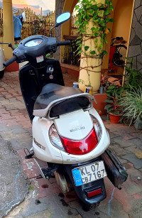 White Suzuki Access 125