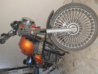Orange Royal Enfield Thunderbird X 350