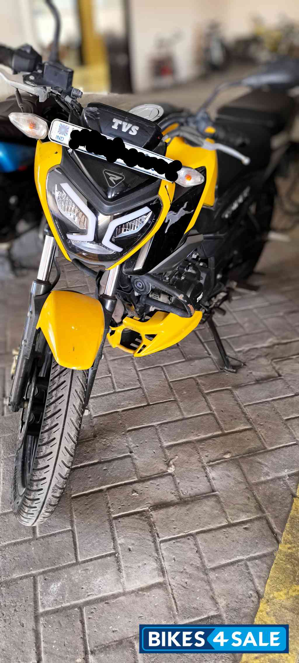 Yellow TVS Raider 125