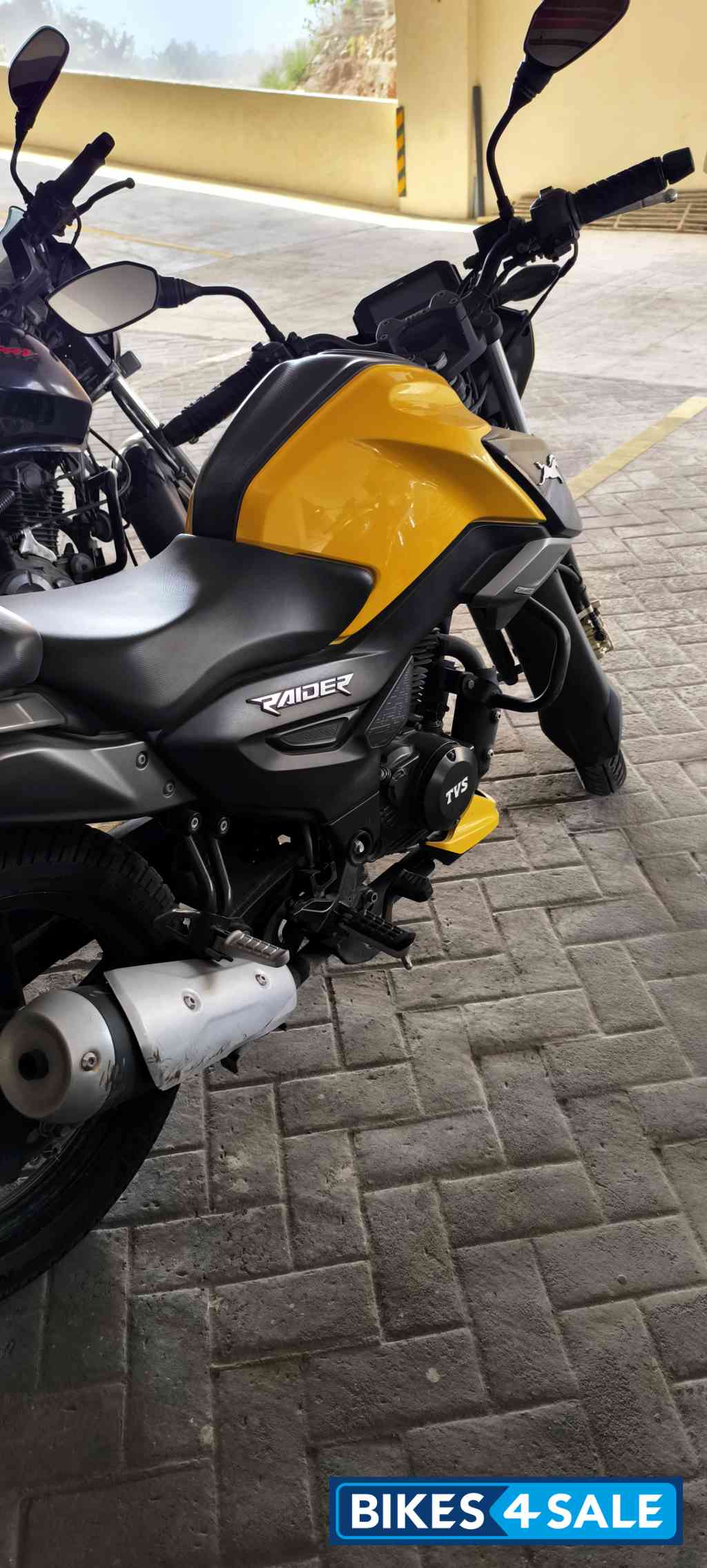 Yellow TVS Raider 125