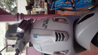 White Vespa SXL 125 BS6