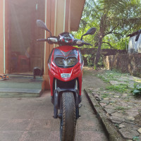 Red & Black Aprilia SR 150