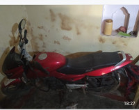 Red Bajaj Pulsar 150