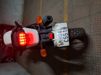 White And Red Royal Enfield Scram 411