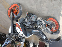 White And Orange KTM Duke 200