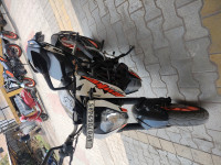White And Orange KTM Duke 200