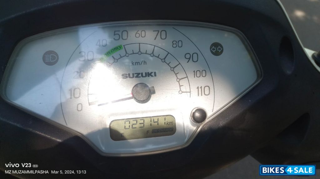 White Suzuki Access 125