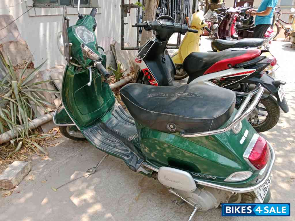 Green Vespa VXL 150