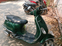Green Vespa VXL 150