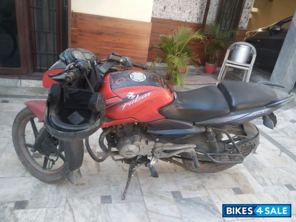 Red Bajaj Pulsar 135LS
