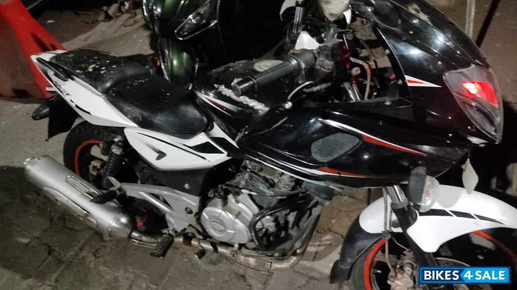 White And Black Bajaj Pulsar 220F