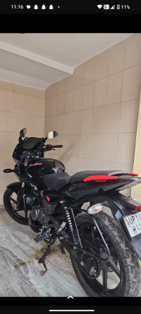 Black And Red Bajaj Pulsar 180F Neon