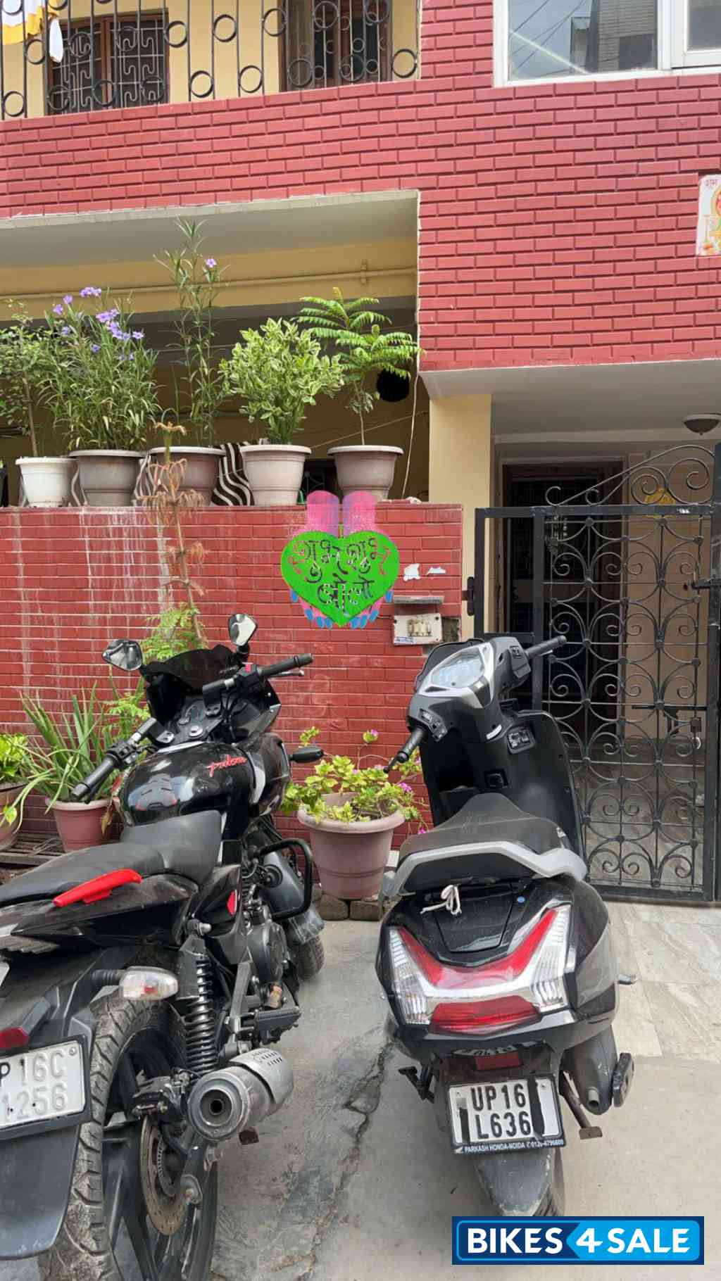 Black And Red Bajaj Pulsar 180F Neon