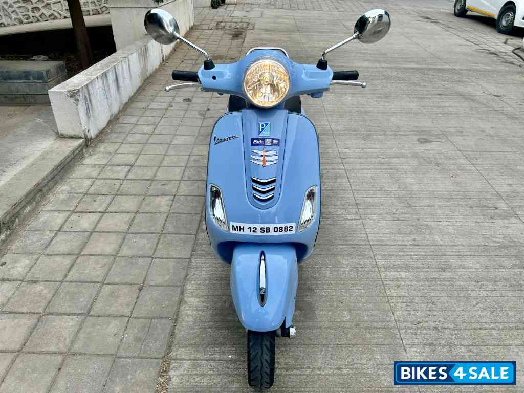 Blue Vespa ZX 125