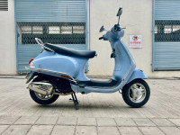 Blue Vespa ZX 125