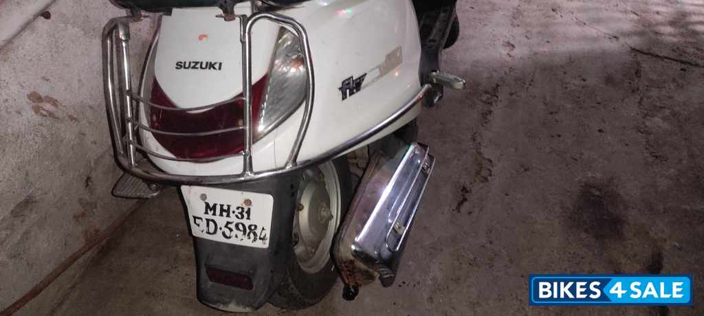 White Suzuki Access 125