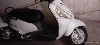White Suzuki Access 125