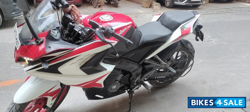 Red And White Bajaj Pulsar RS 200 ABS