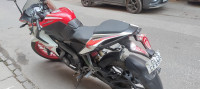 Red And White Bajaj Pulsar RS 200 ABS