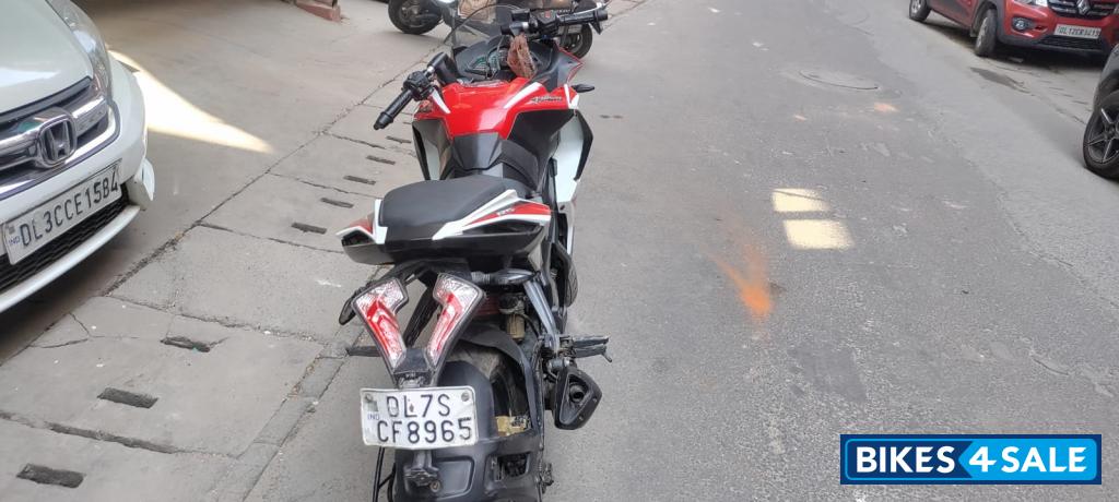 Red And White Bajaj Pulsar RS 200 ABS