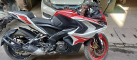 Red And White Bajaj Pulsar RS 200 ABS
