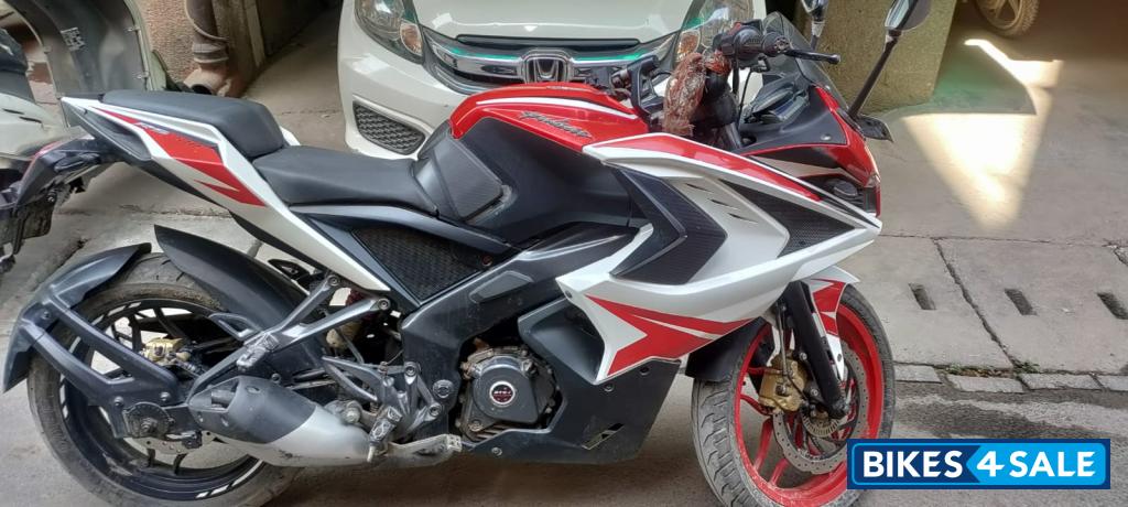 Red And White Bajaj Pulsar RS 200 ABS