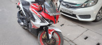 Red And White Bajaj Pulsar RS 200 ABS