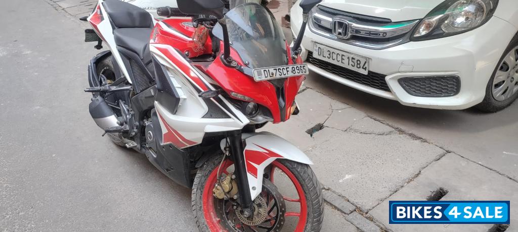 Red And White Bajaj Pulsar RS 200 ABS