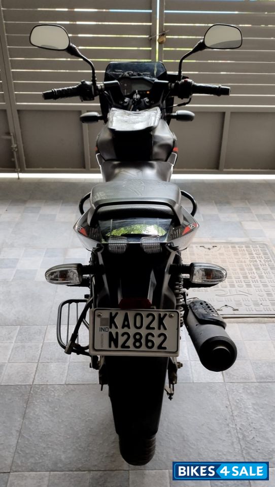 Black/red Bajaj Pulsar 125