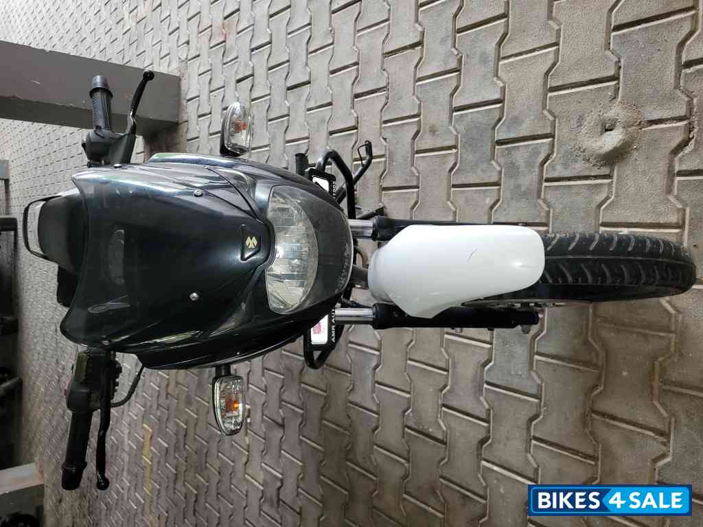 White And Black Bajaj Pulsar 150 DTSi