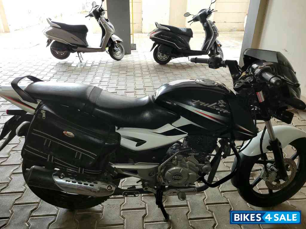 White And Black Bajaj Pulsar 150 DTSi