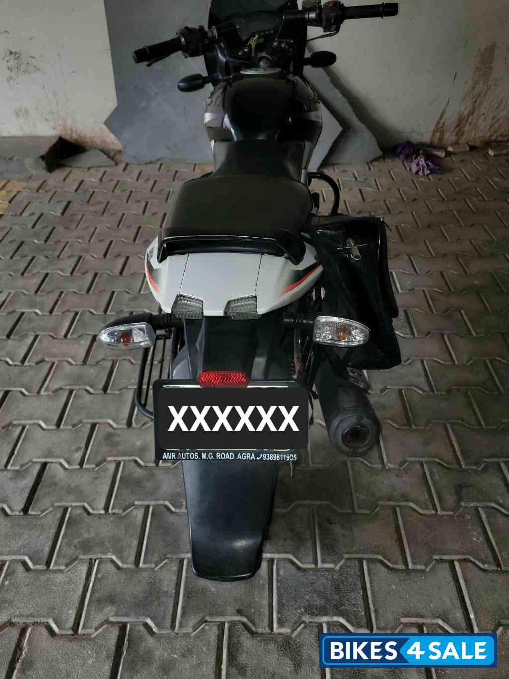 White And Black Bajaj Pulsar 150 DTSi