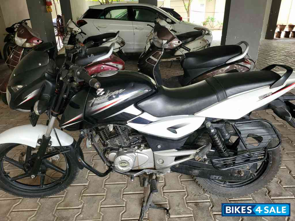 White And Black Bajaj Pulsar 150 DTSi