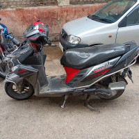 Black Yamaha Cygnus Ray ZR Street Rally