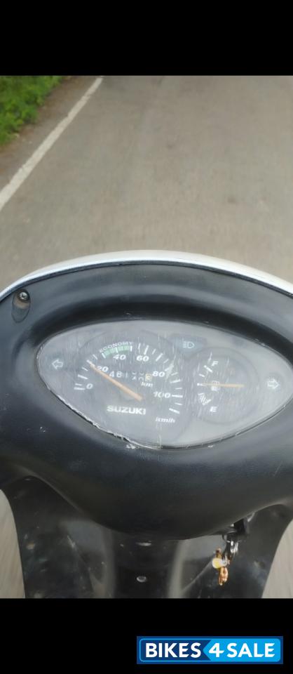 White Suzuki Access 125